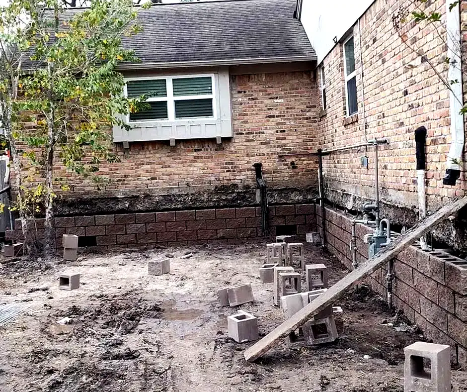 Backyard of a brick house Foundation Repair Youngstown, OH